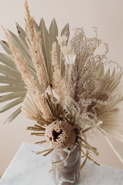 Aesthetic dried floral bouquet in earthy tones, perfect for modern home decor.